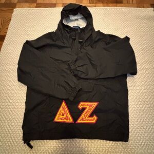 Delta Zeta Black pullover hoodie with embroidered letters. Wind rain resistant